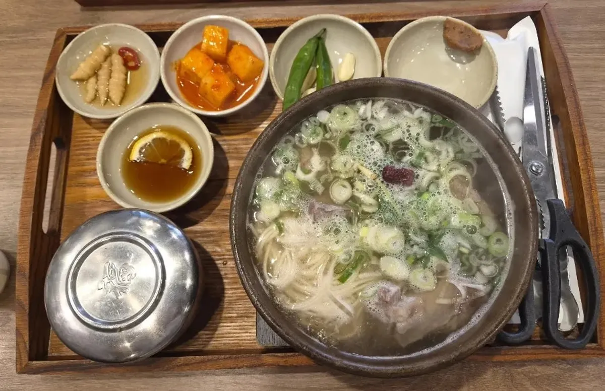 A bowl of galbitang with large ribs