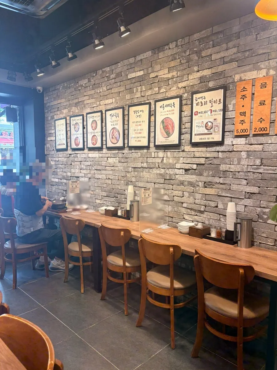 Single seats and bar table seating at Gang Galbitang