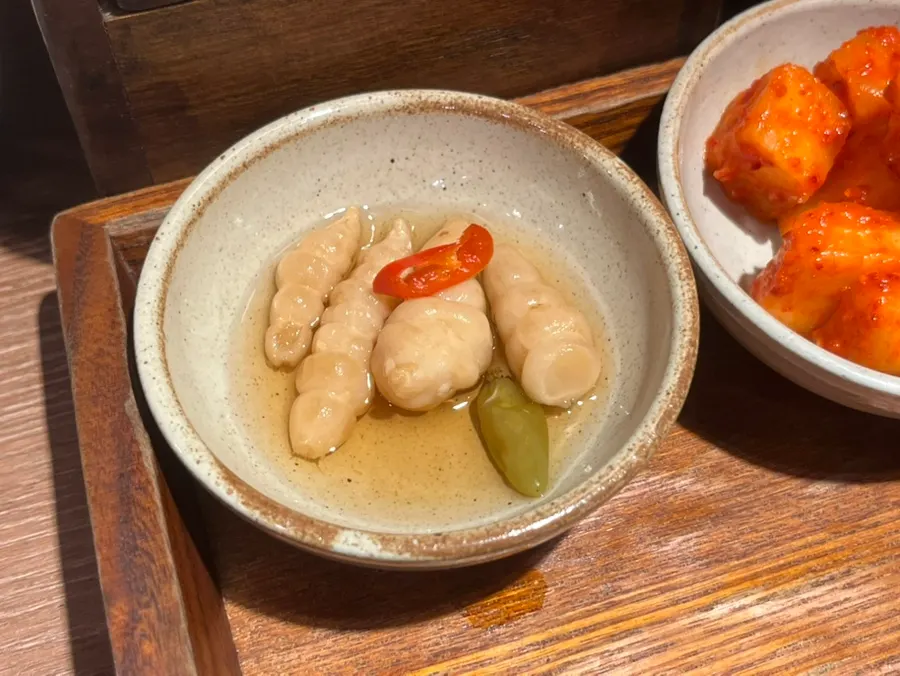 Lemon soy sauce, pickles, and kkakdugi side dishes