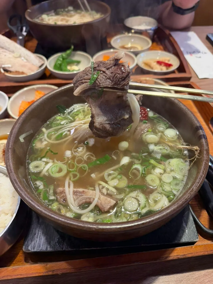 A piece of rib topped with kkakdugi