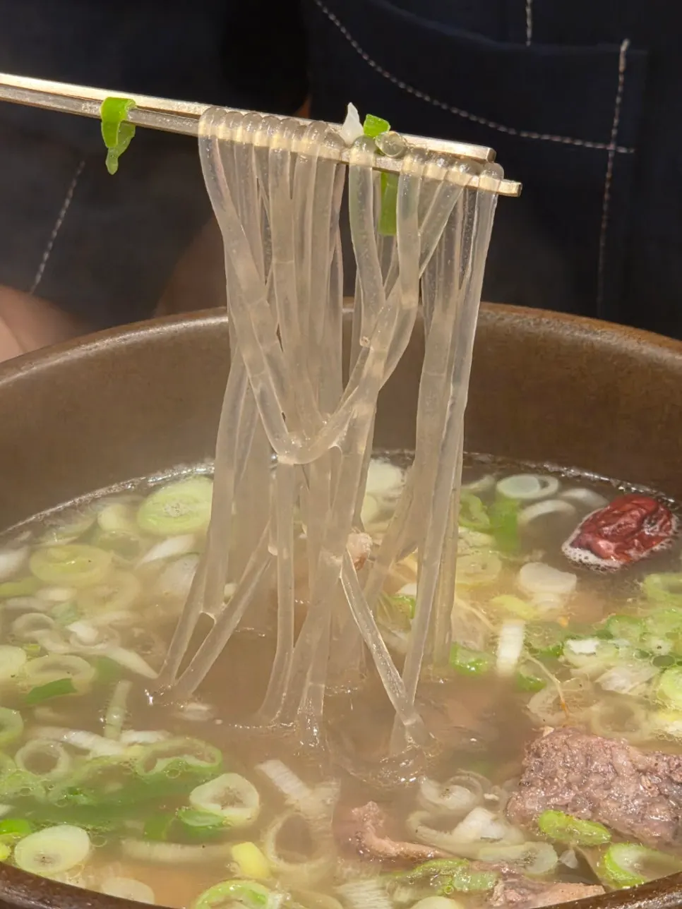 Side dishes and sauce served with galbitang