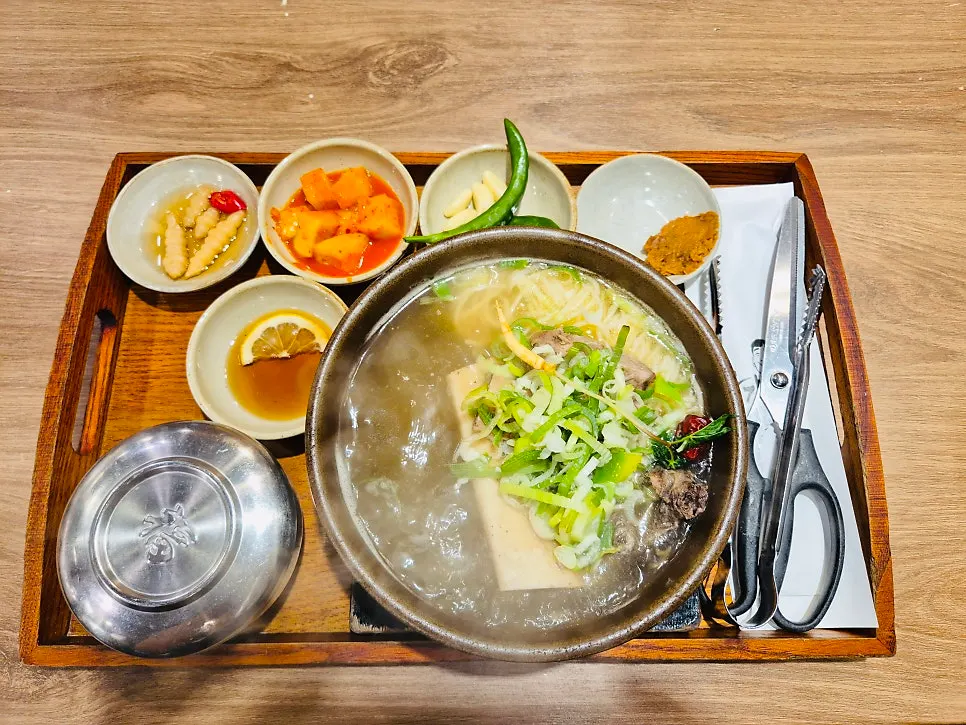 Galbitang served bubbling in a stone pot