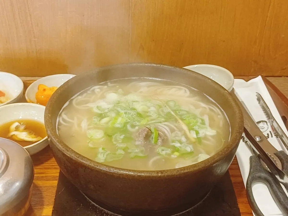 A serving of galbitang with added jungmyeon noodles