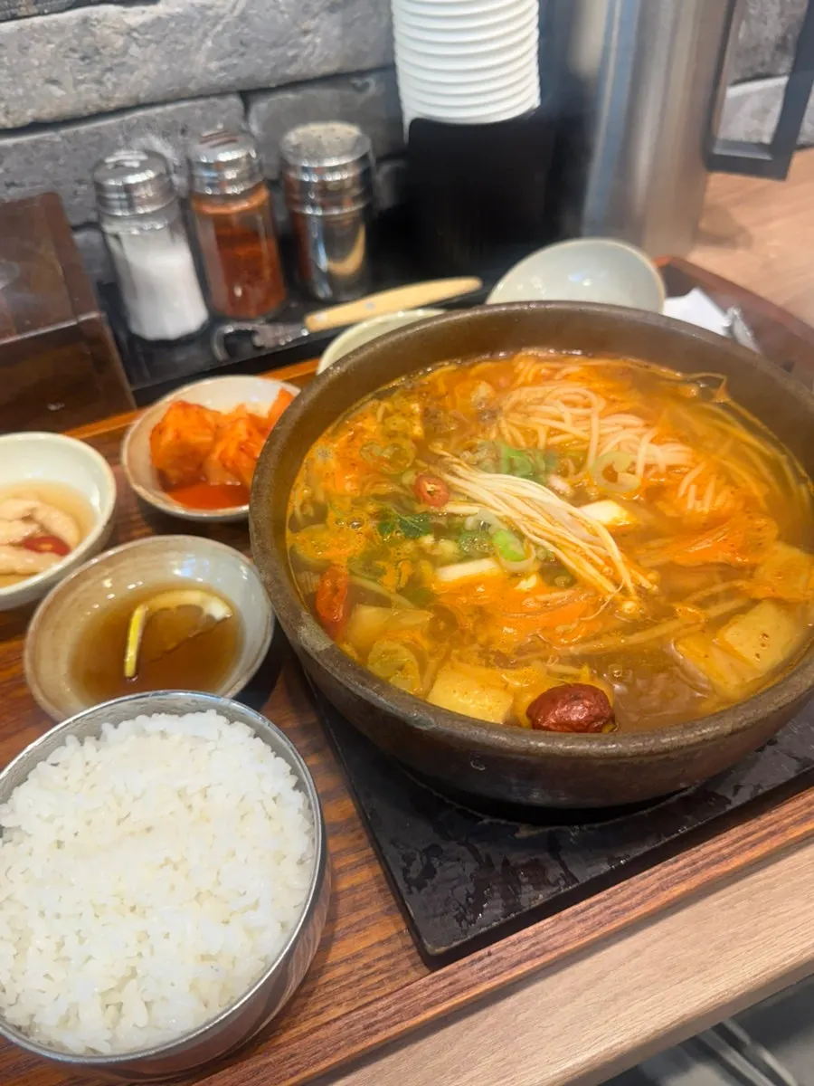 Gang galbitang bubbling away in a stone bowl