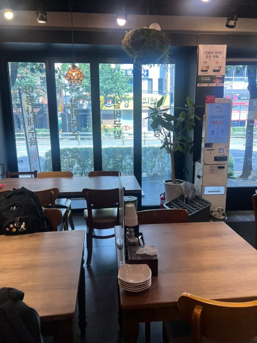 Interior of Gang Galbitang with tables and a bar table