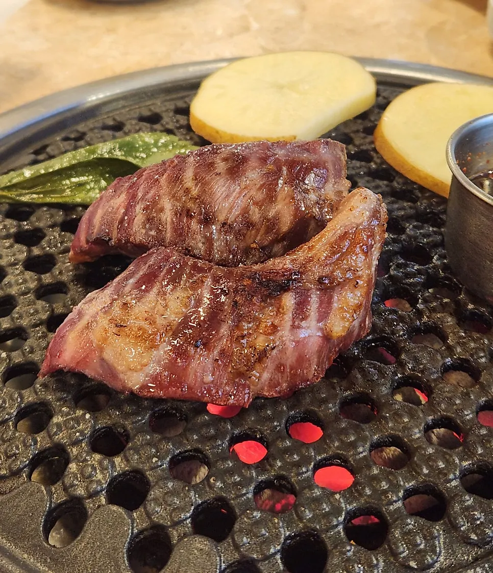 Gamjagisal wrapped in grilled pickled perilla leaf