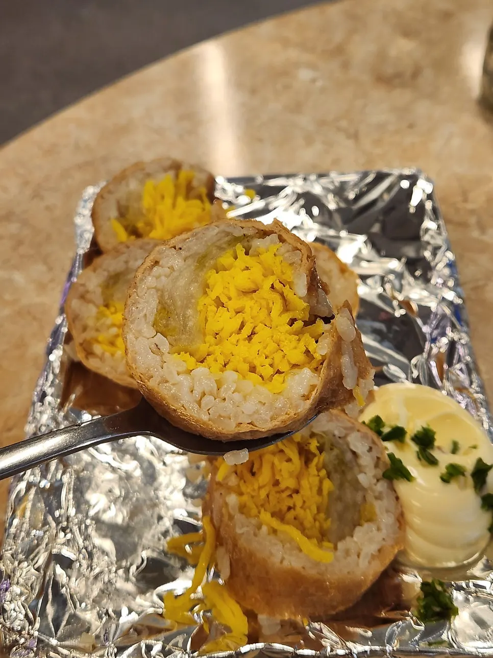 Fried tofu pocket gimbap filled with egg garnish