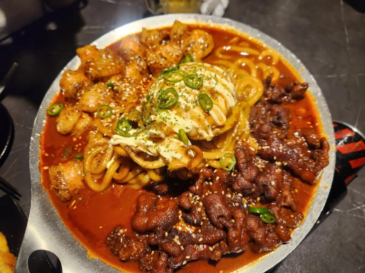 O-Dae-Bal platter with beef intestines, chicken feet, and whole cuttlefish