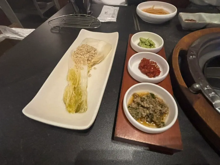 Baek-kimchi, wasabi, salted seafood, and pickled pepper side dishes