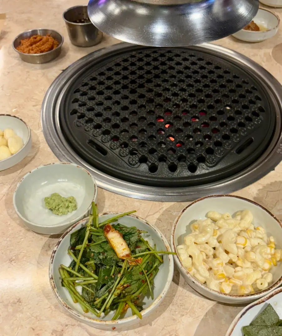 Side dishes set out before the meat arrives