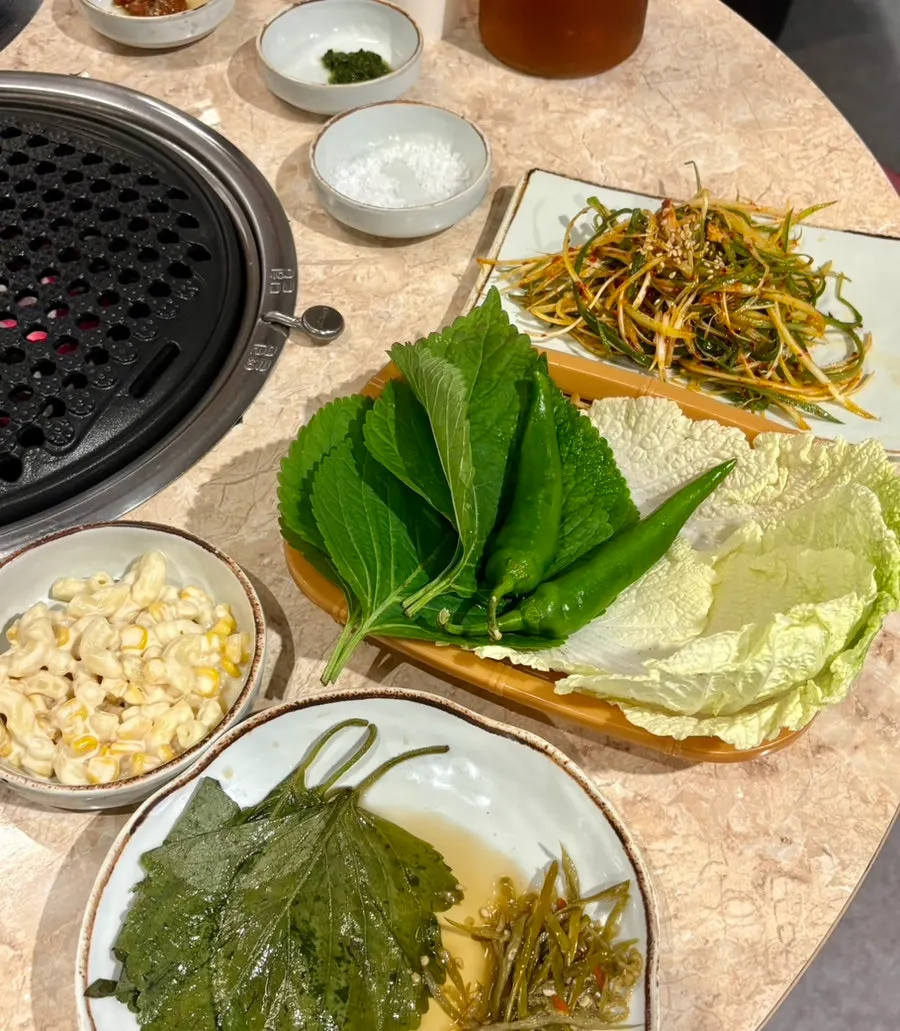 Plate of side dishes including pickled vegetables