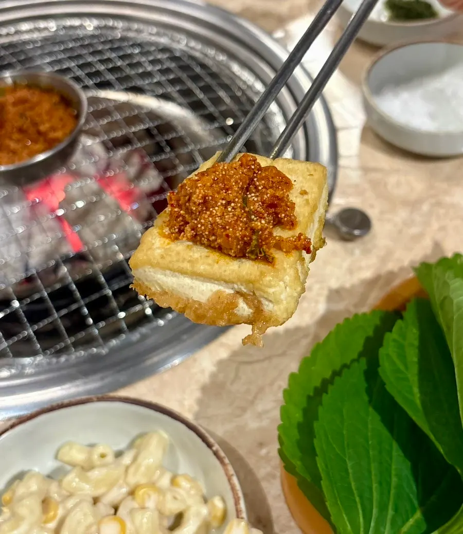 Signature pollack roe sauce next to the tofu pancake