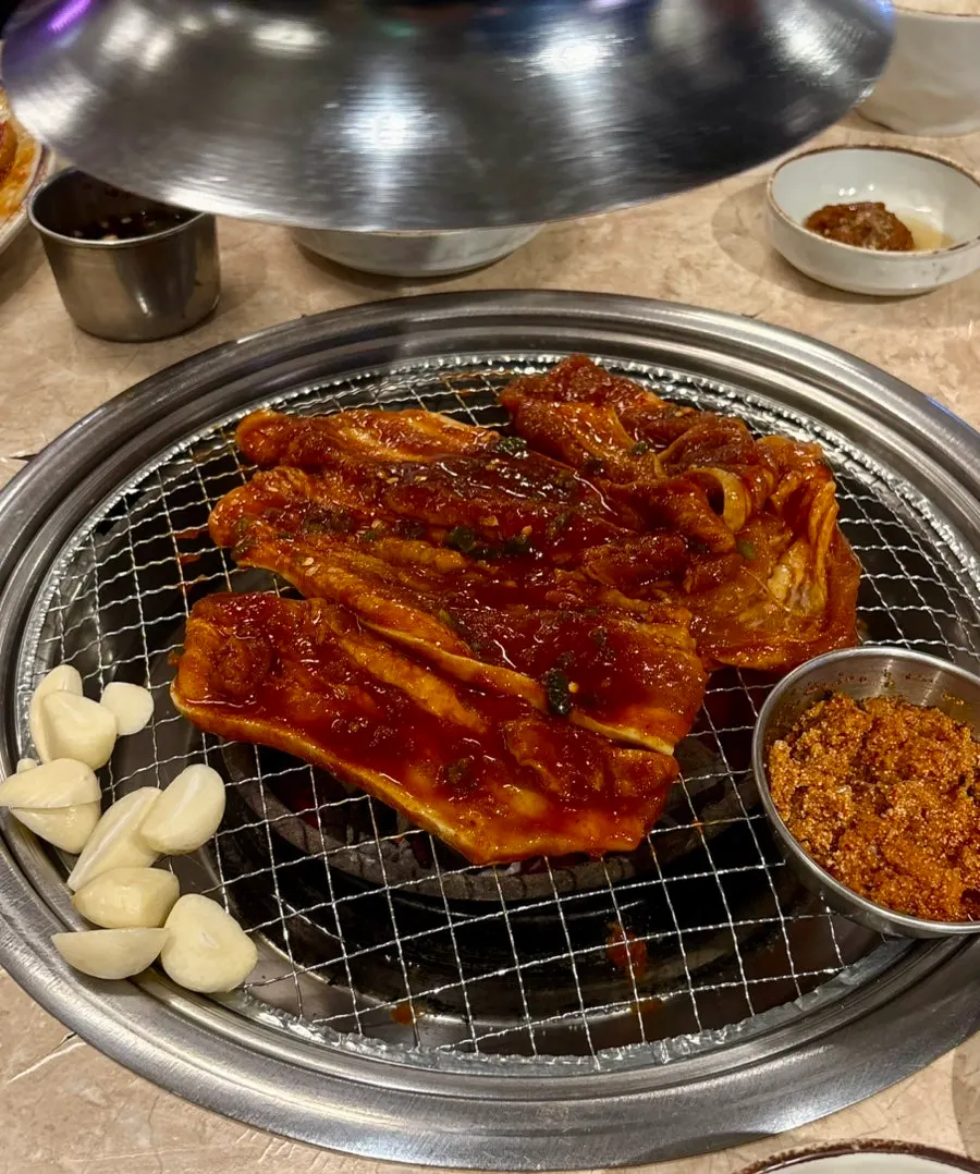 Raw gochujang-marinated samgyeopsal before grilling