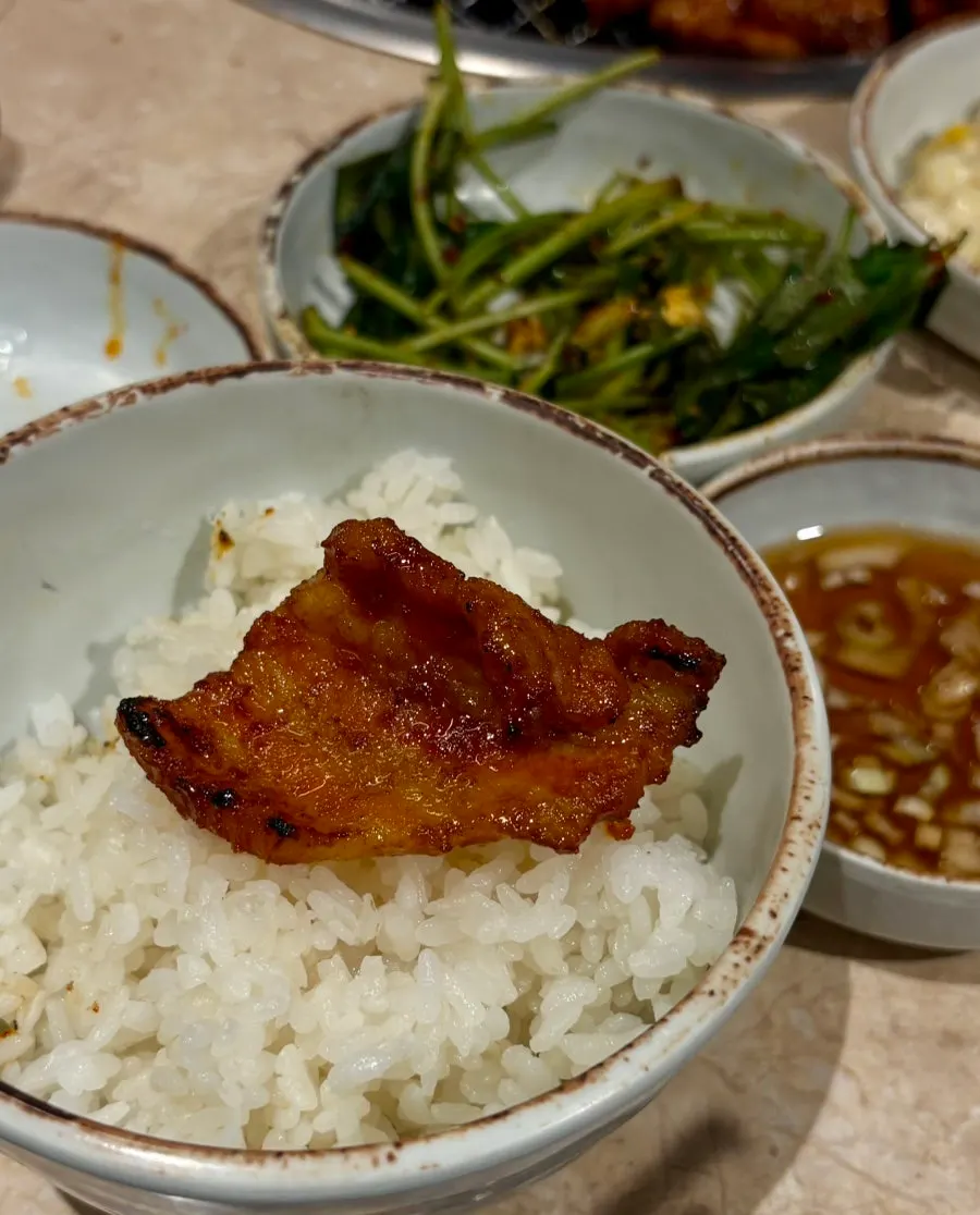 Gochujang samgyeopsal finished with a torch for smoky flavor