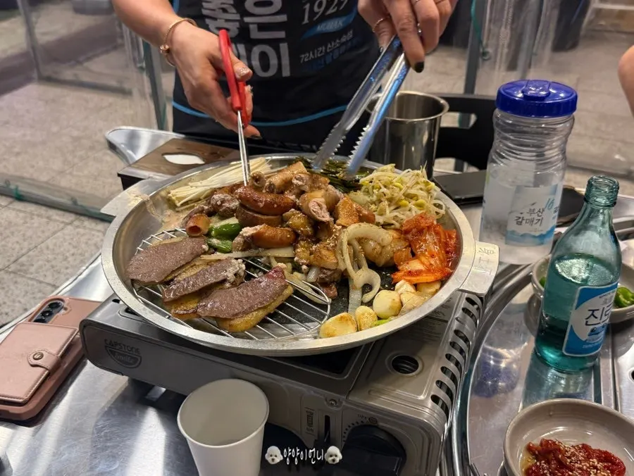 Mixed grill cooking on the grill plate