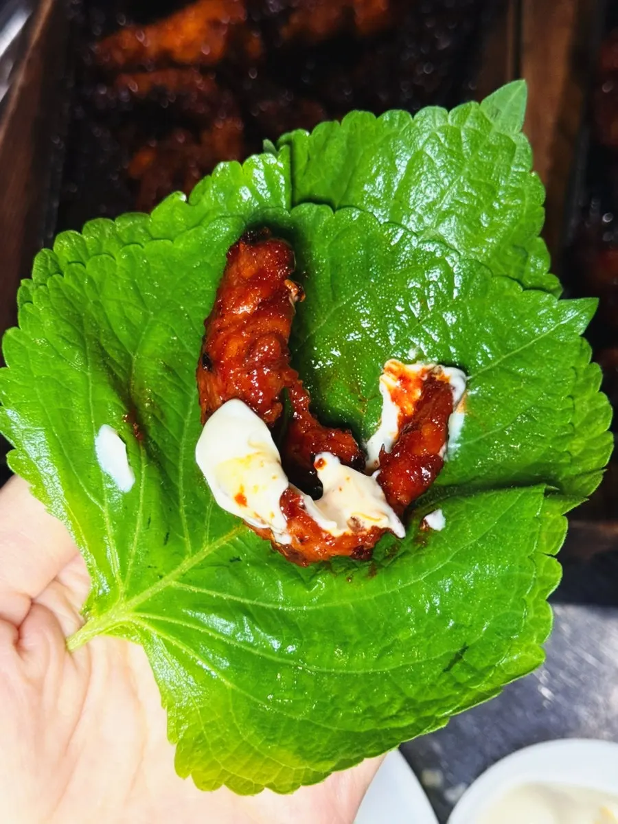 A plate with chicken neck and boneless dakbal alternated