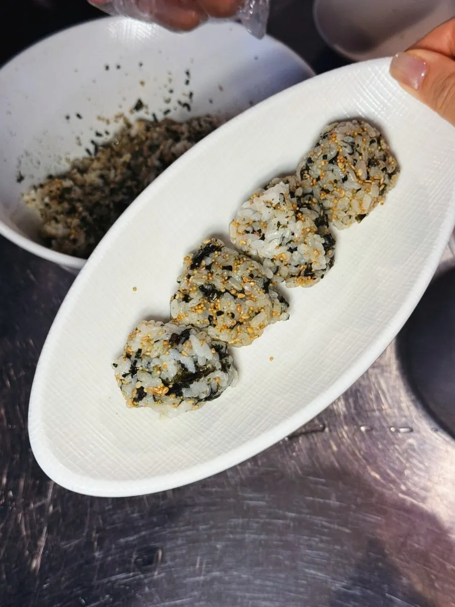 Ingredients for a self-made rice ball topped with furikake and mayo