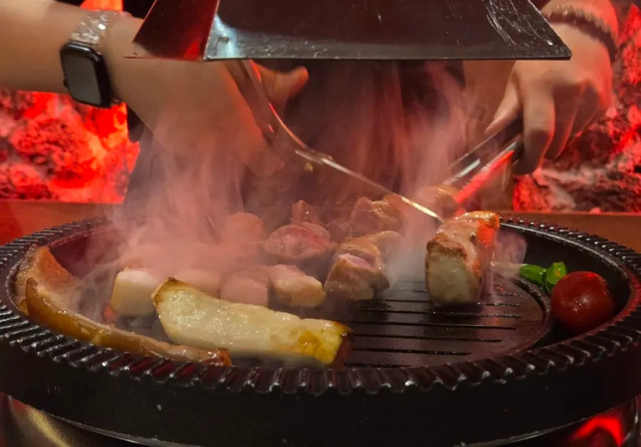 Pork and vegetables on the grill