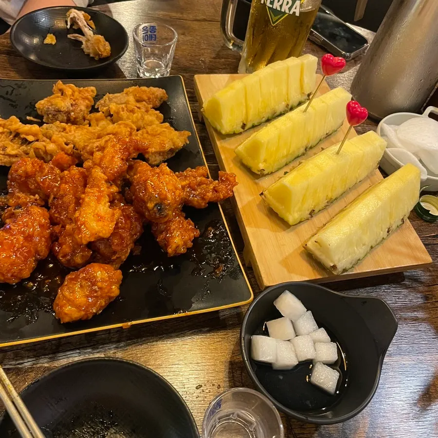 Generous plate of pineapple served as a drinking snack