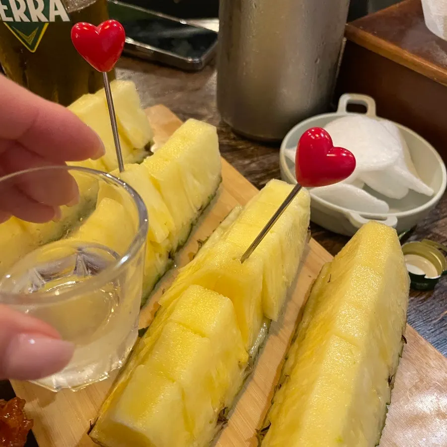 Heart-shaped fork served with the fruit
