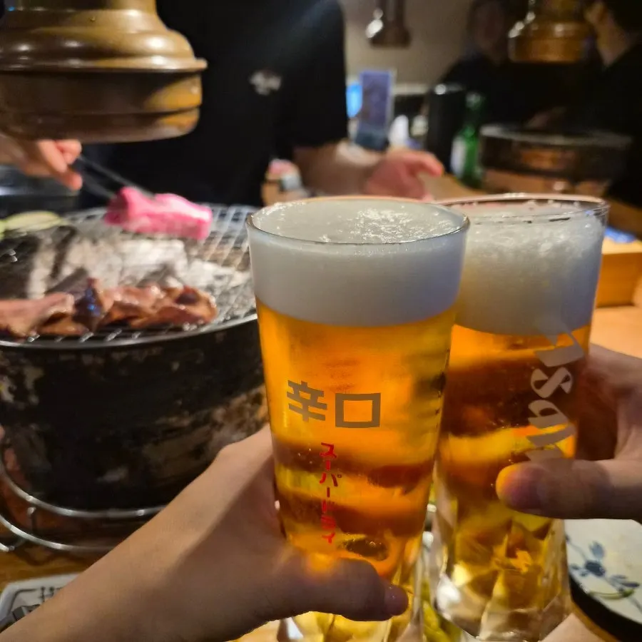 Korean beef tongue grilled by a staff member