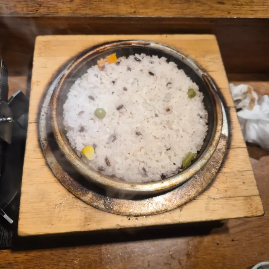 Sukiyaki beef dipped in egg yolk