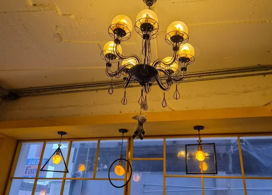 Interior of Teppan King with yellow lighting and Japanese-style decor