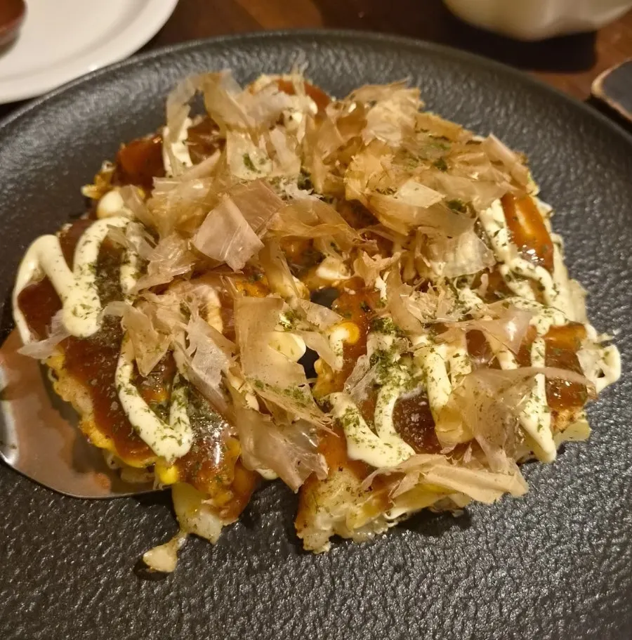 Special okonomiyaki topped with bonito flakes