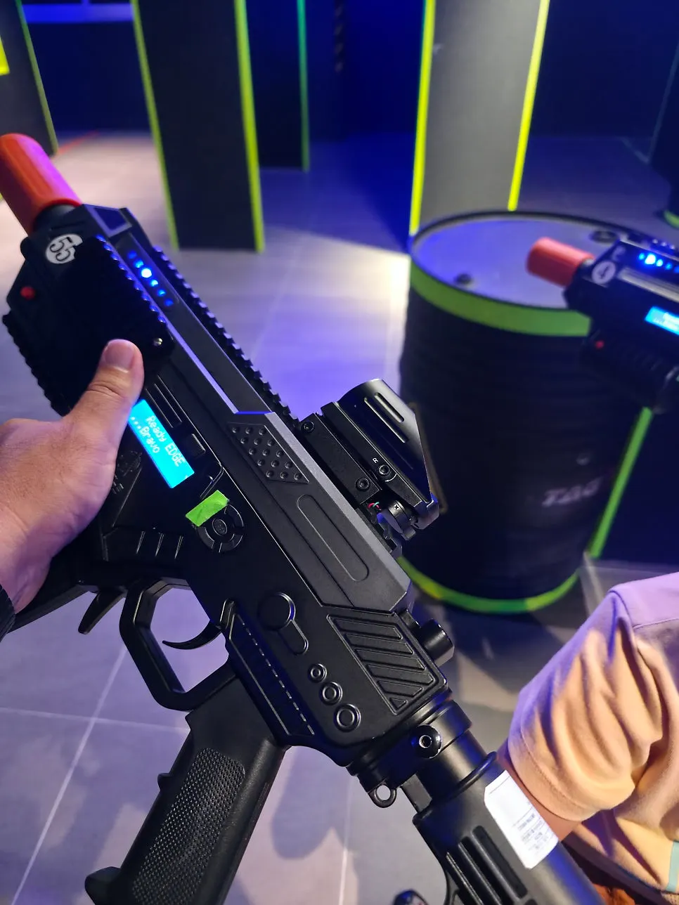 Kids aiming their guns at dad