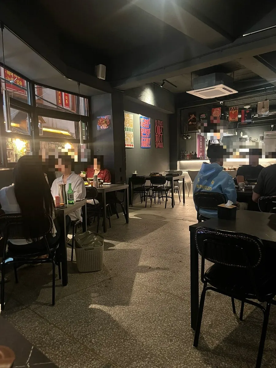 Dimly lit table inside Yuumangju Seomyeon Branch