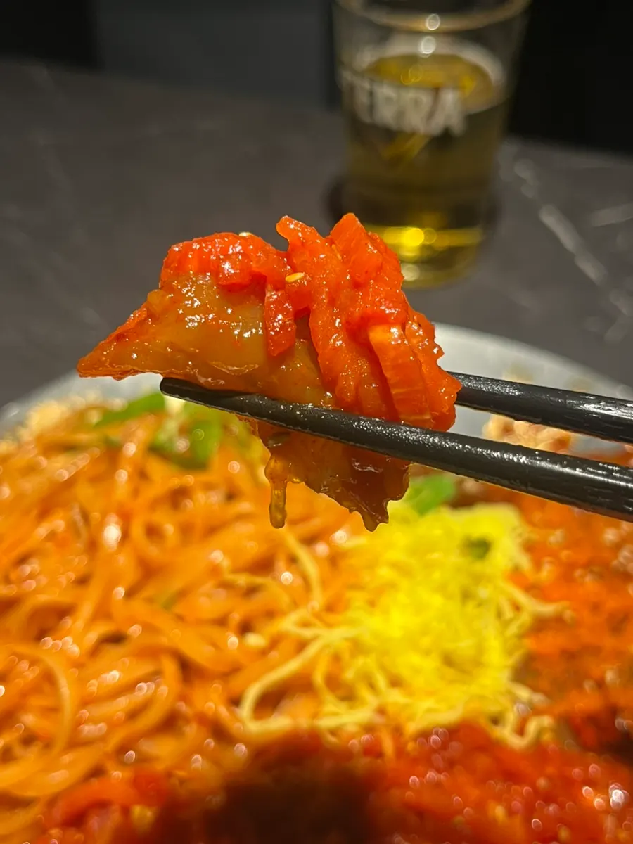 Beef tartare piled on top of shrimp