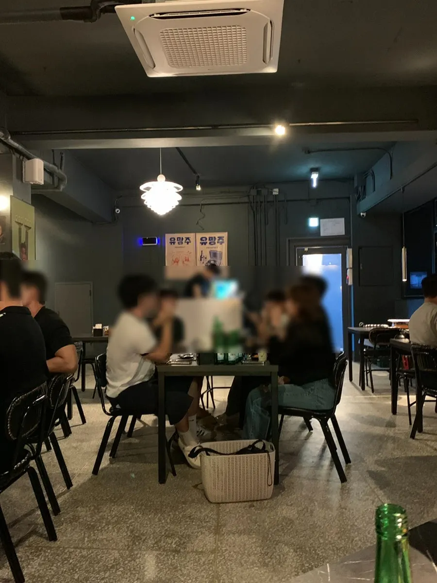 Interior of the bar filled with guests