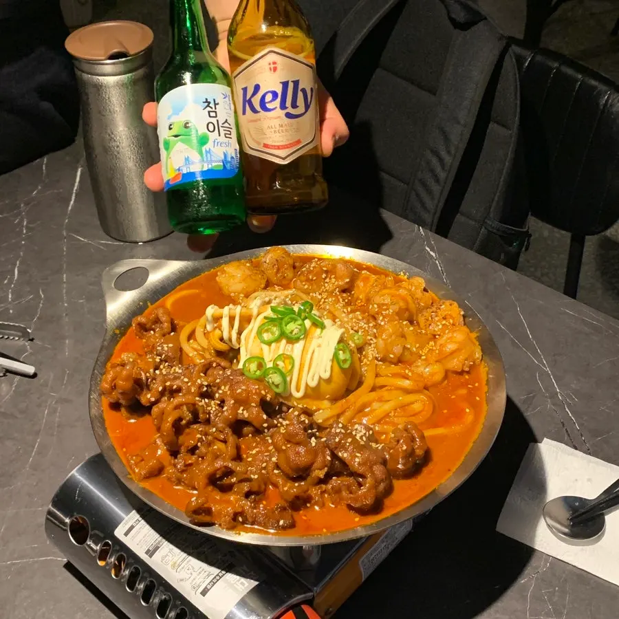 O-Dae-Bal platter photographed with a beer bottle