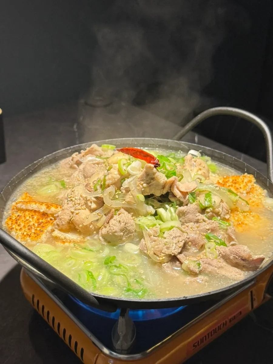 Boiled pork nurungji chicken soup with meat piled high