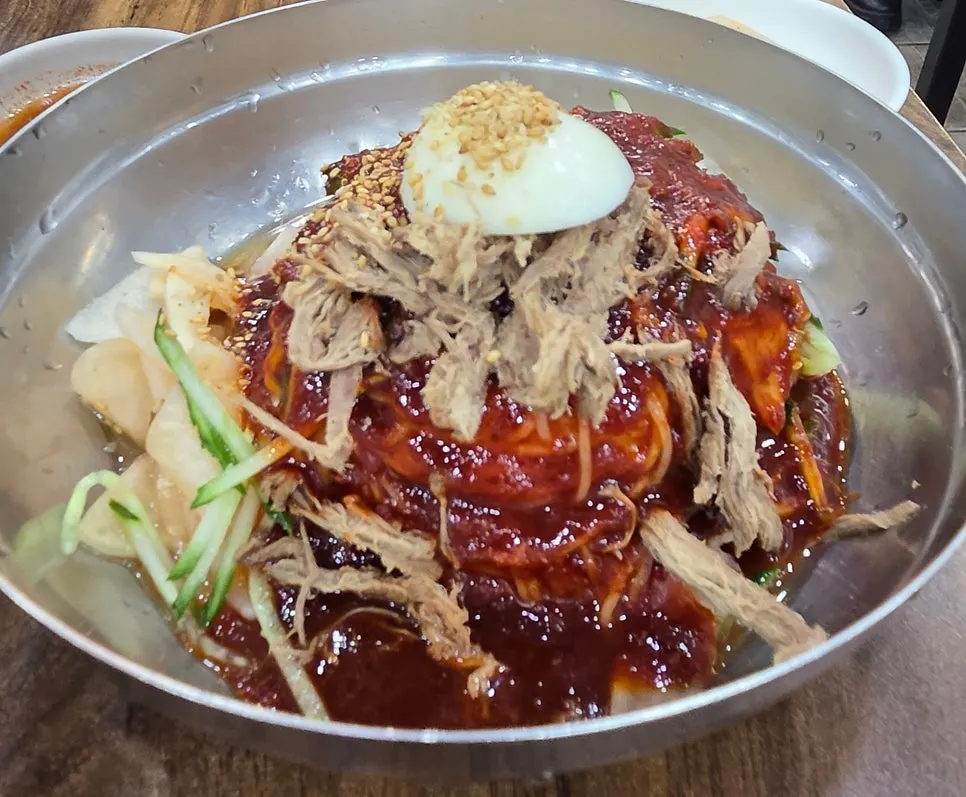 Bibim-milmyeon topped with sauce at Seomyeon Milmyeon