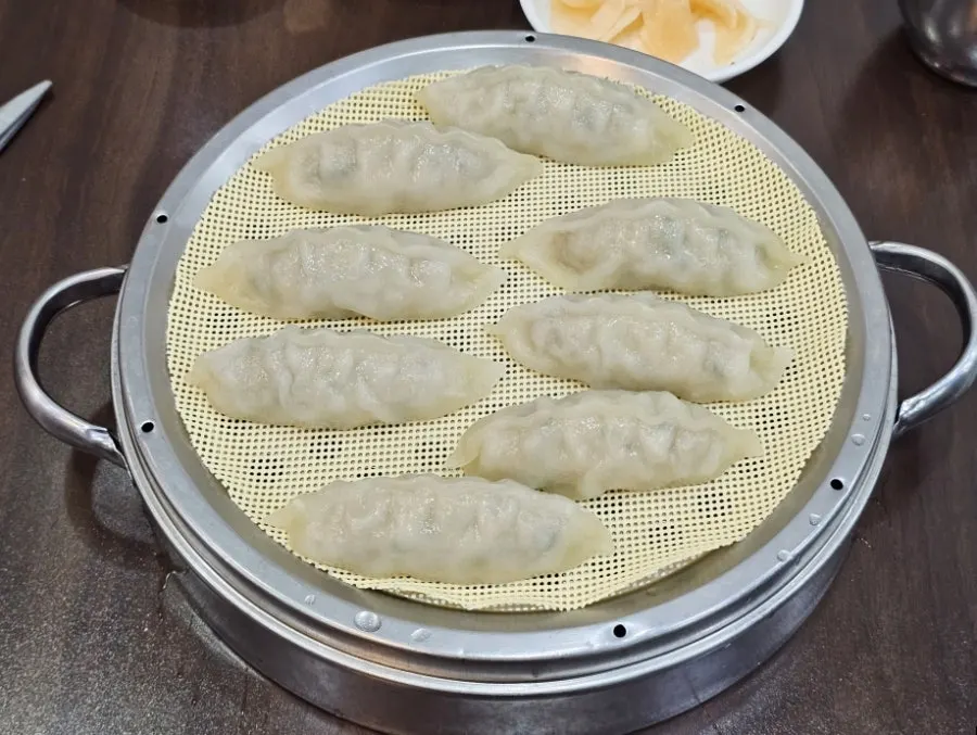 A plate of dumplings served first at Seomyeon Milmyeon