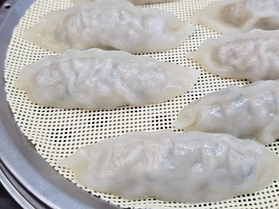 Close-up of dumplings with skin so thin the filling shows through