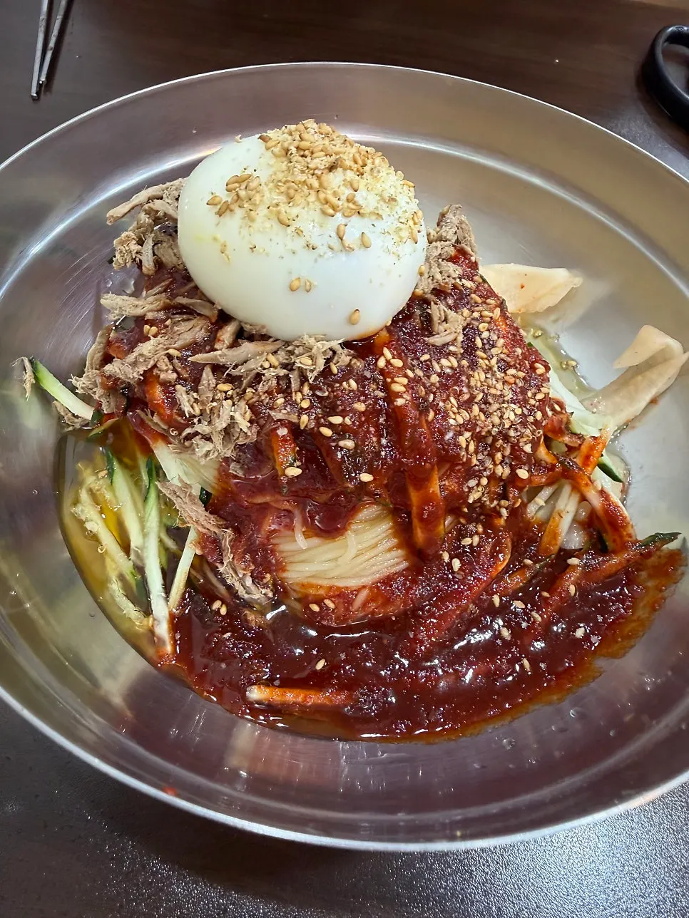 Close-up of mul milmyeon noodles topped with shaved ice