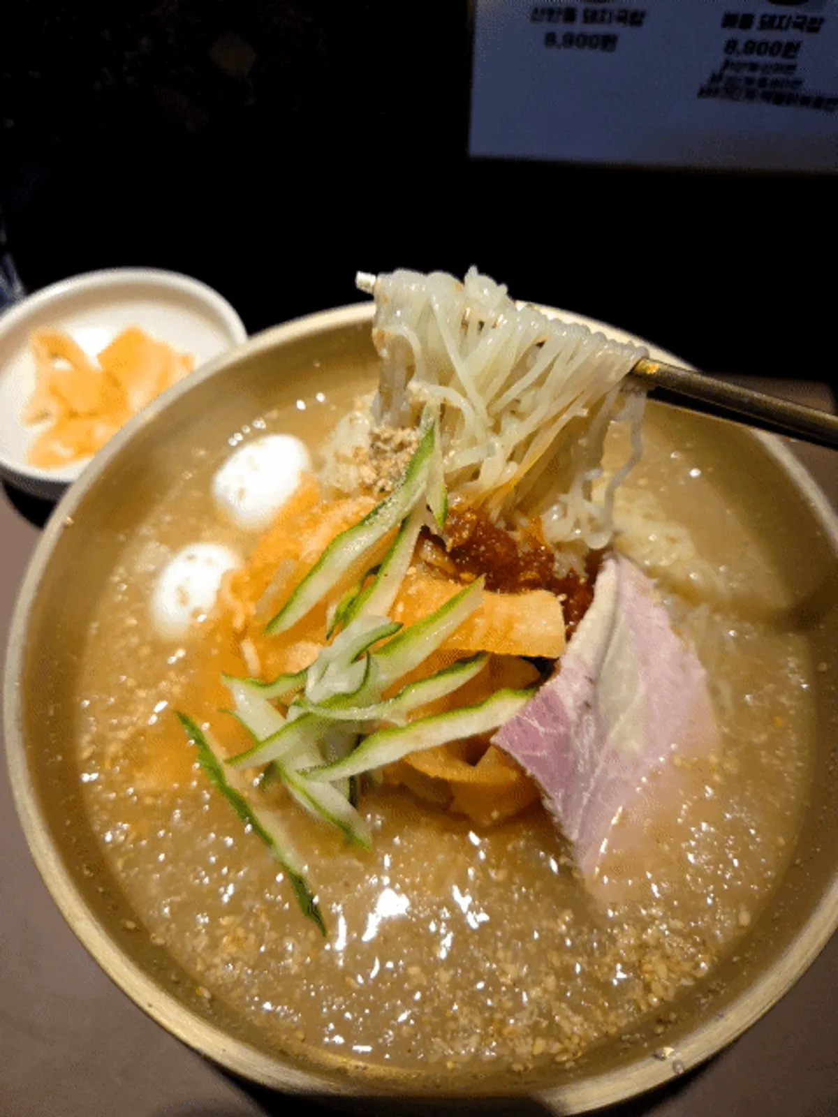 Water milmyeon and spicy mixed milmyeon ordered at Sanbandeul Pork Gukbap