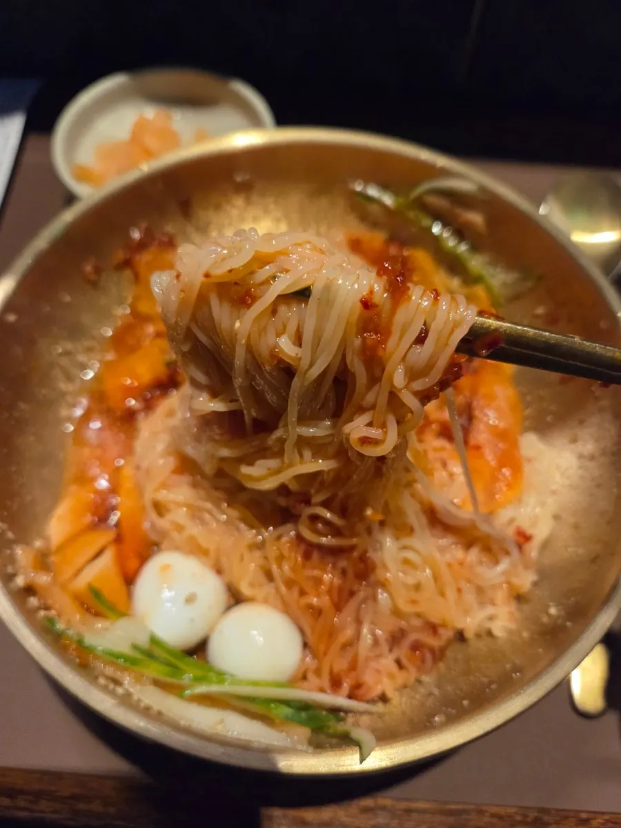 Spicy mixed milmyeon with savory seasoning