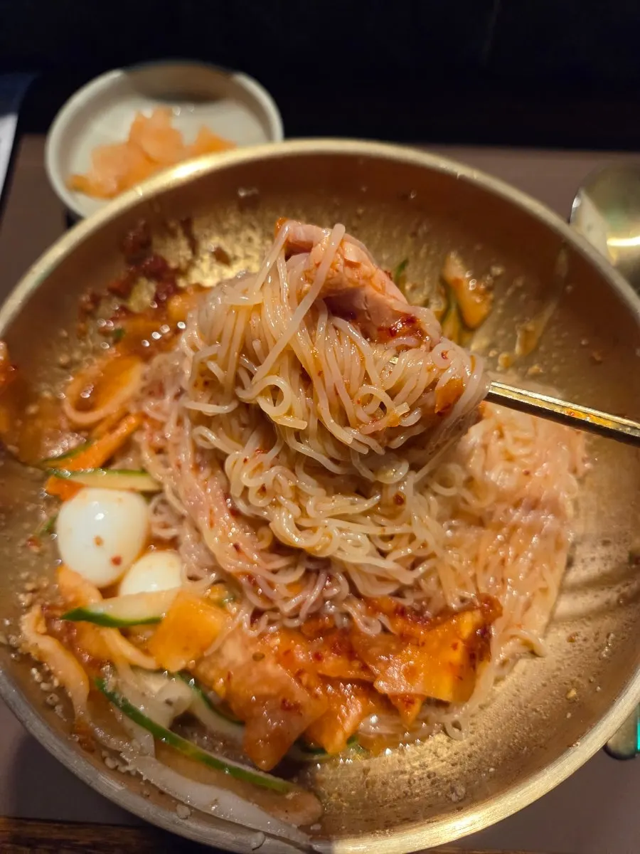 Spicy mixed milmyeon with savory seasoning