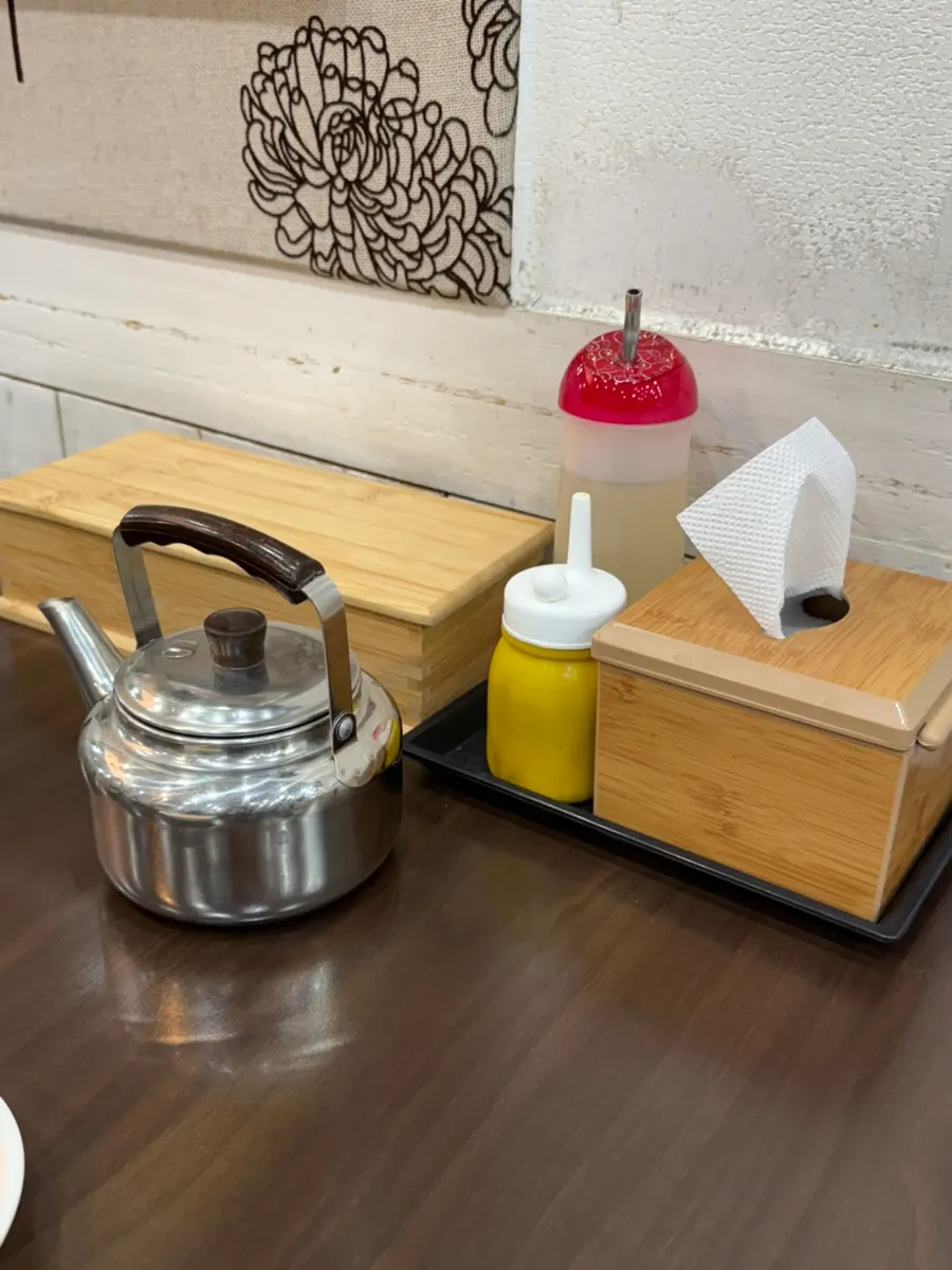 A cup of warm broth at Seomyeon Milmyeon