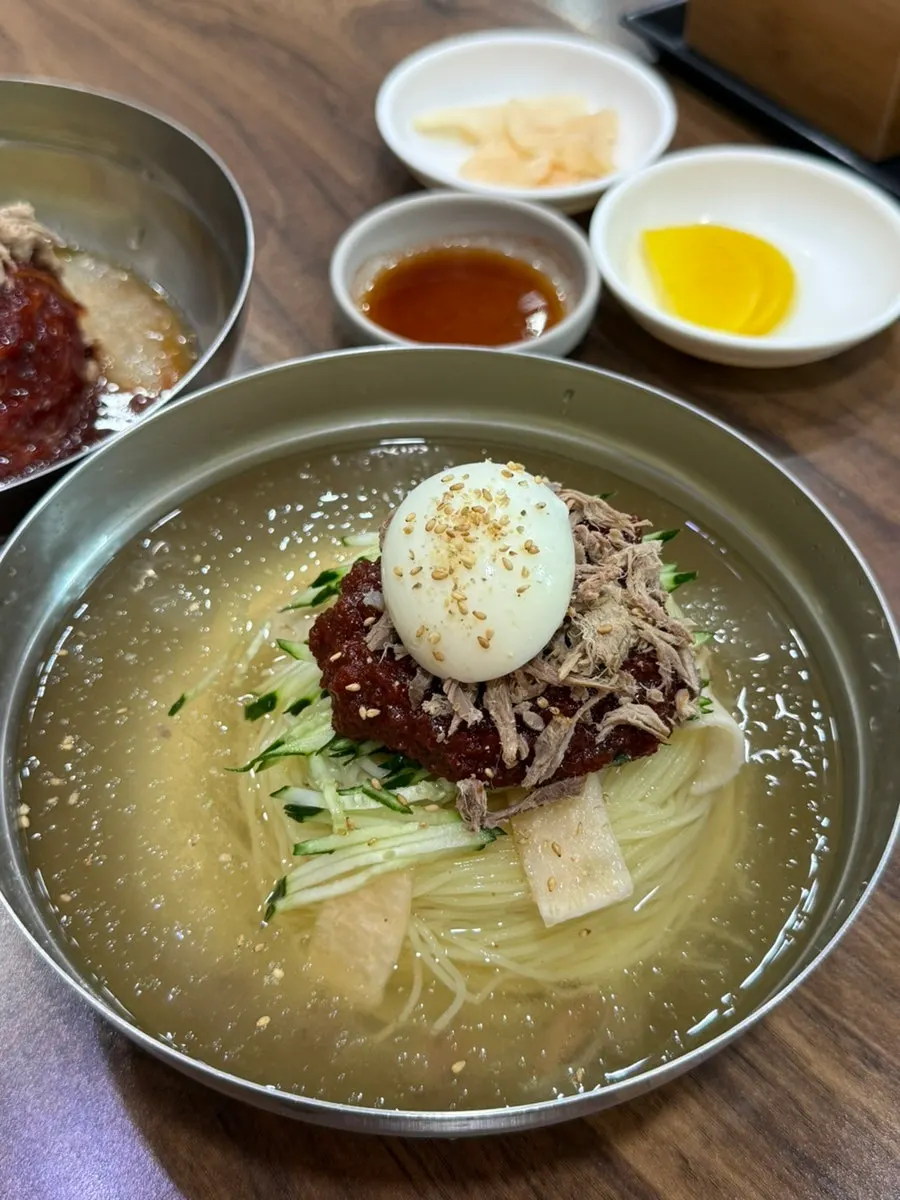 Water milmyeon at Seomyeon Milmyeon piled high with toppings