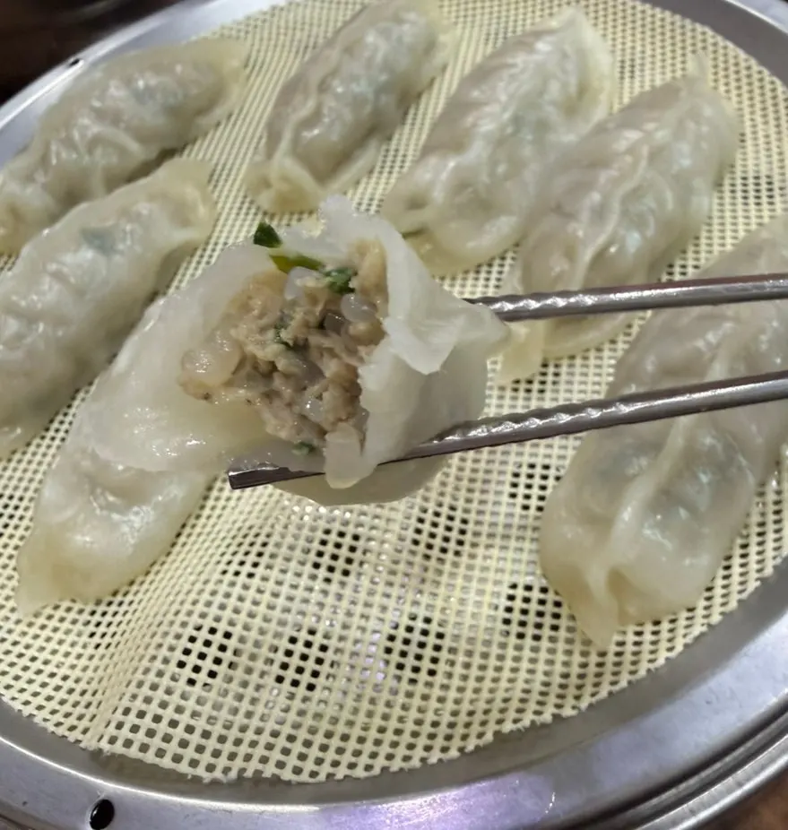 Inside of a Seomyeon Milmyeon dumpling packed with meat filling