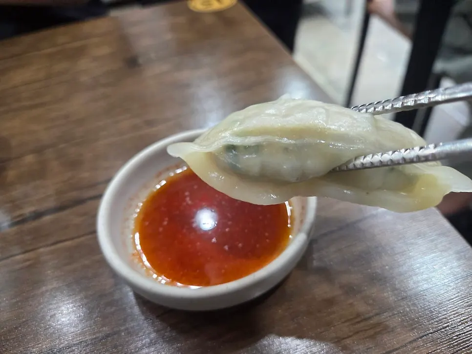 A plate of dumplings served at the table