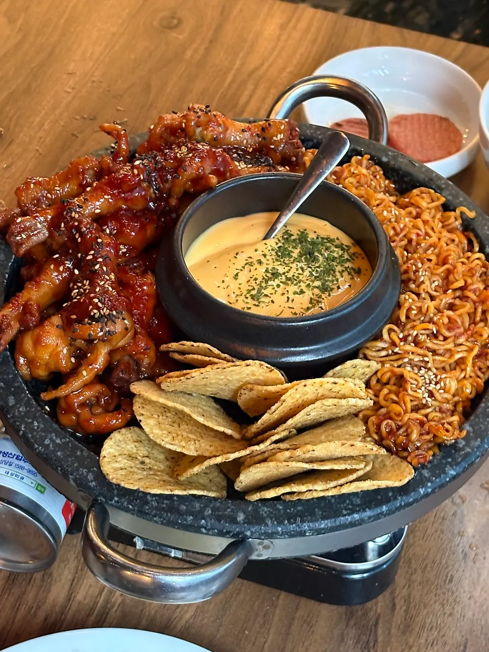 Tulip-cut chicken feet served with cheddar cheese and nachos