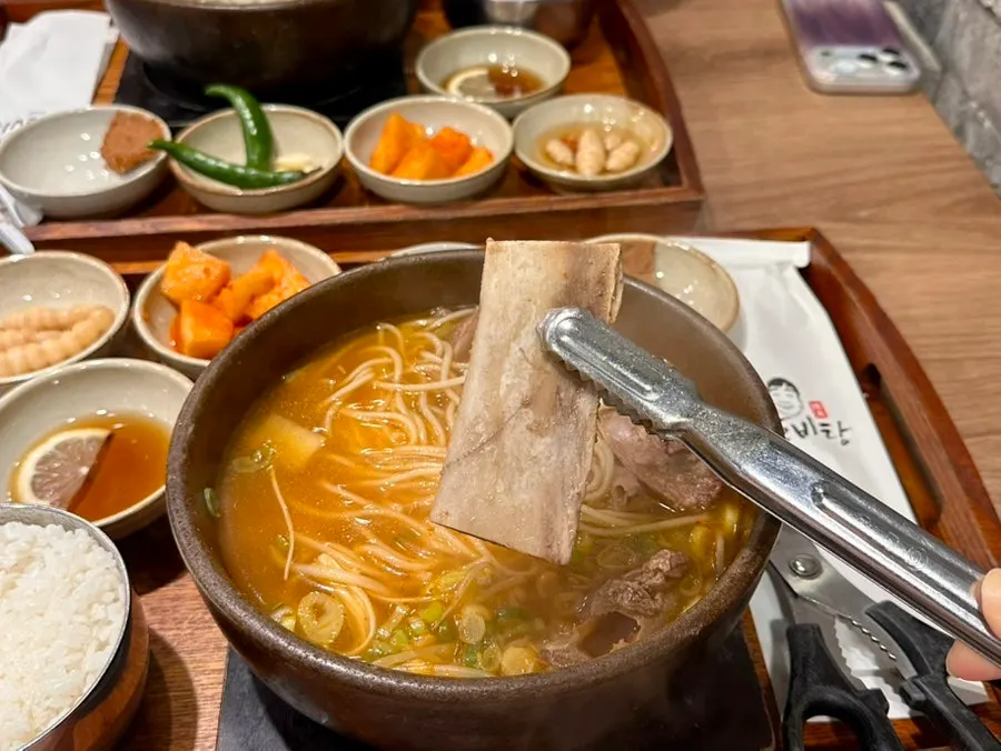 Medium noodles blended into the broth