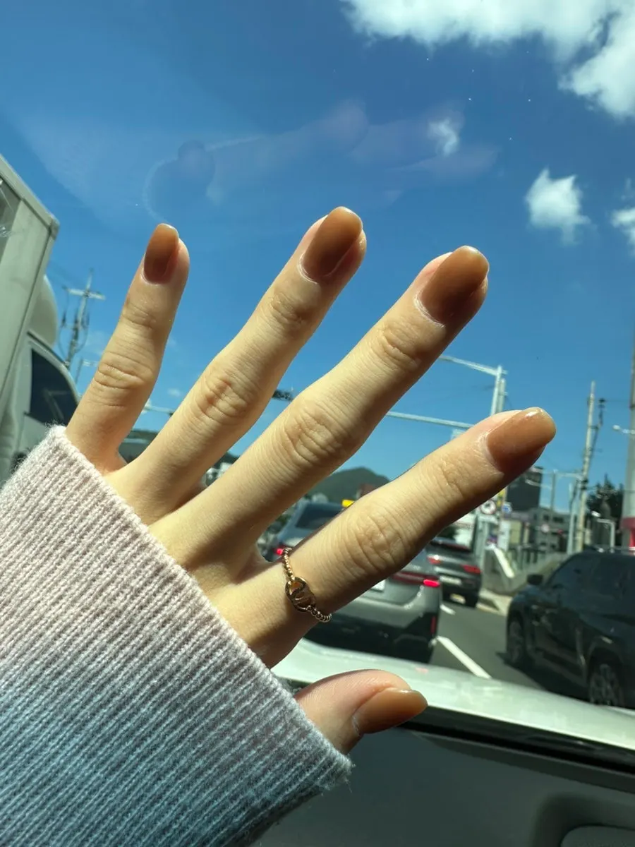 Brown one-color nails done at Jsu Beauty in Seomyeon
