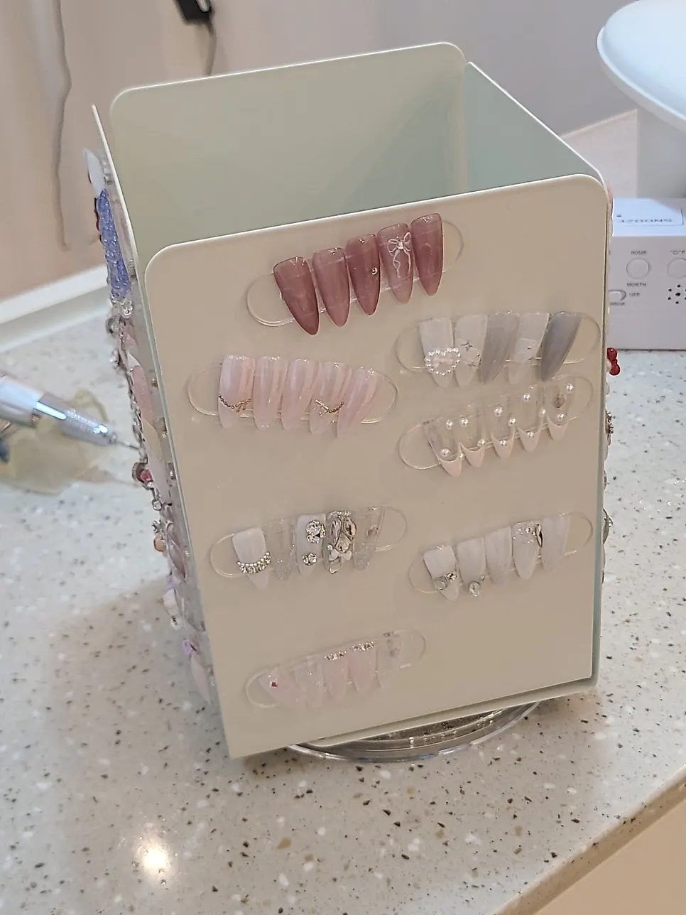 Nail treatment seating area with color display