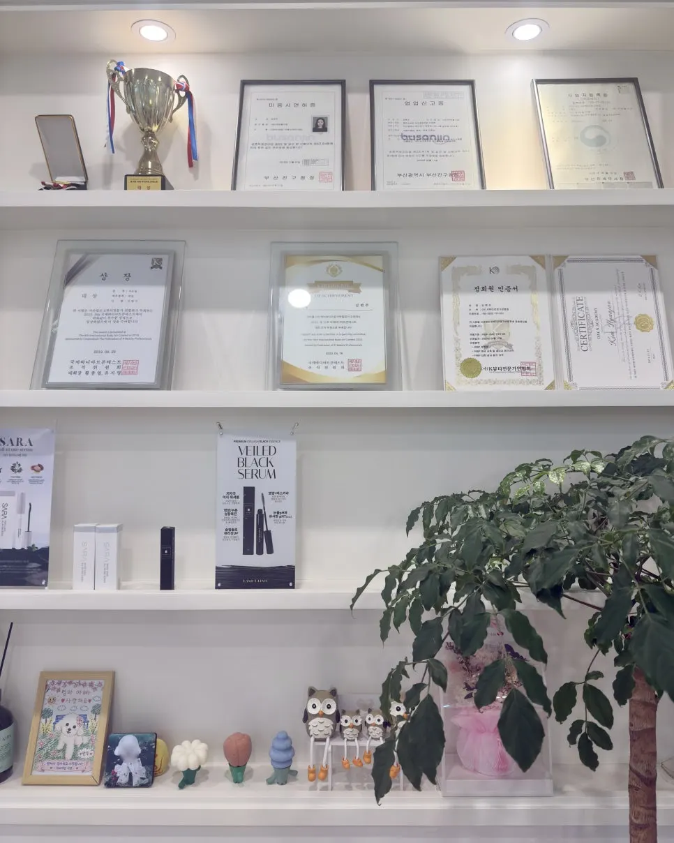 Certifications and career information displayed in the salon